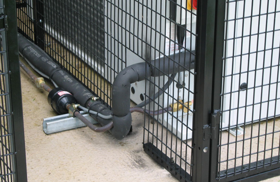 air conditioning cage cut out around piperwork