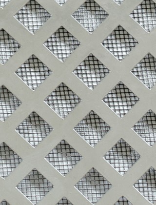 Lattice stainless 1X1m with black backing mesh cut to size