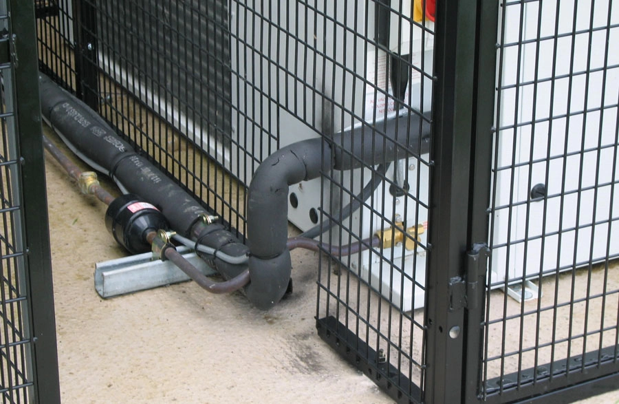 air conditioning cage cut out around piperwork