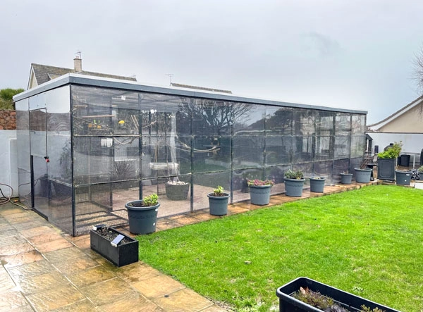aviary with perspex waterproofing