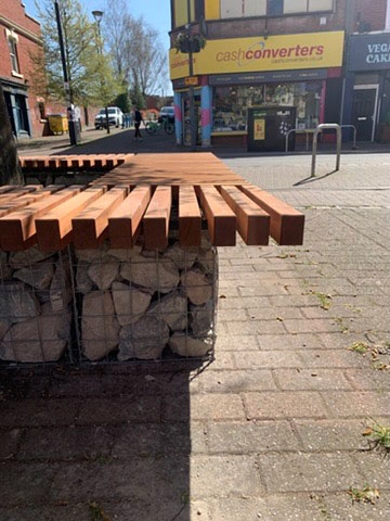 Gabion bench around tree