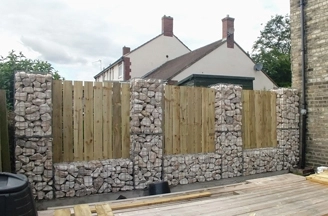 Timber & gabion boundary fence
