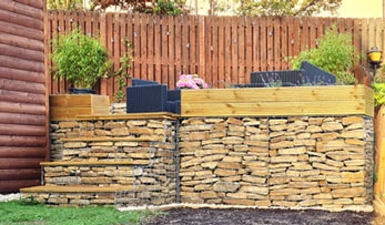 Gabion steps to raised decking seating area