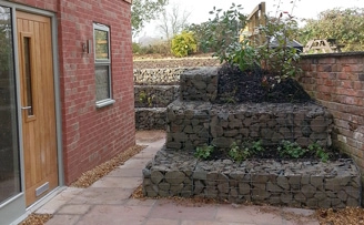 Mr Gleaves' Planted garden retaining wall