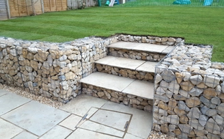 Dave's Gabion levelled and returfed back garden.