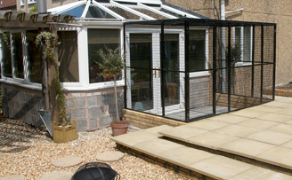 The Mathews' aviary extending from their conservatory. The Mathews' aviary extending from their conservatory.