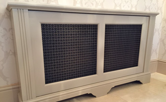 Renovating a large Manor House, radiator covers with interwoven grilles.
