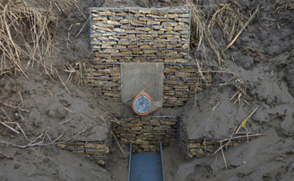 Gabions used to create an outlet into the river from waste water Gabions used to create an outlet into the river from waste water