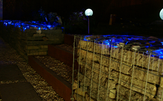 Gabion wall using Reclaimed slab and lighting Gabion wall using Reclaimed slab and lighting